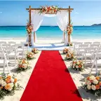 Red carpet aisle runner leading to a beach wedding arch